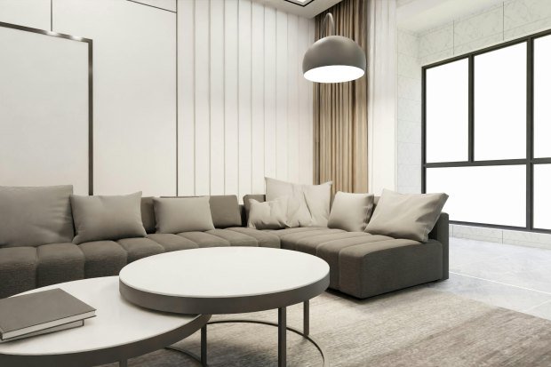 Elegant modern living room with minimalist decor and ample natural light.